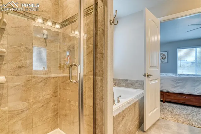 a bathroom with a granite countertop shower mirror and a sink