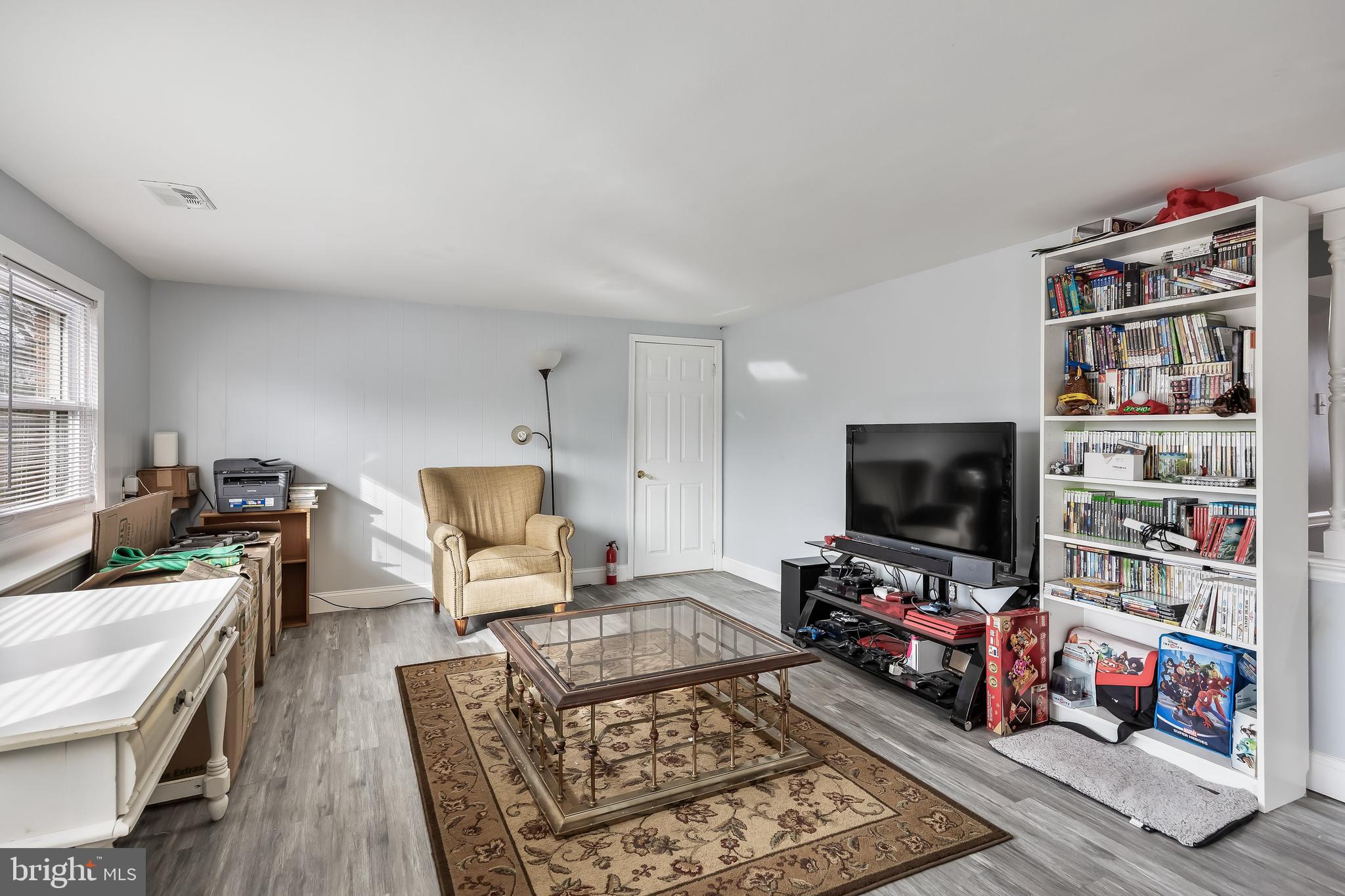 51 Suburban Boulevard Delran, NJ 08075 - Photo 15 of 29 a living room with furniture and a flat screen tv