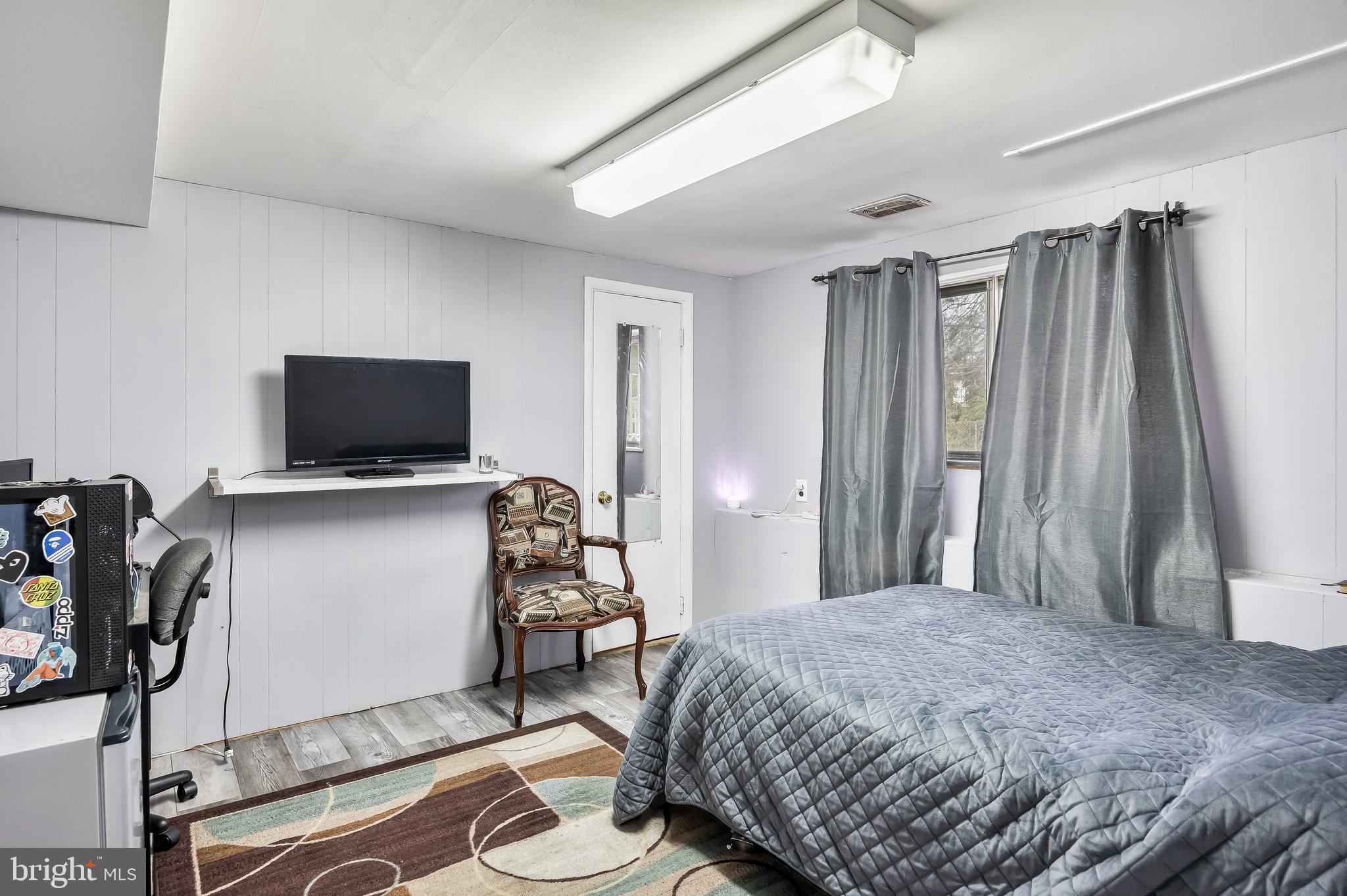 51 Suburban Boulevard Delran, NJ 08075 - Photo 18 of 29 a bedroom with a bed and a flat screen tv