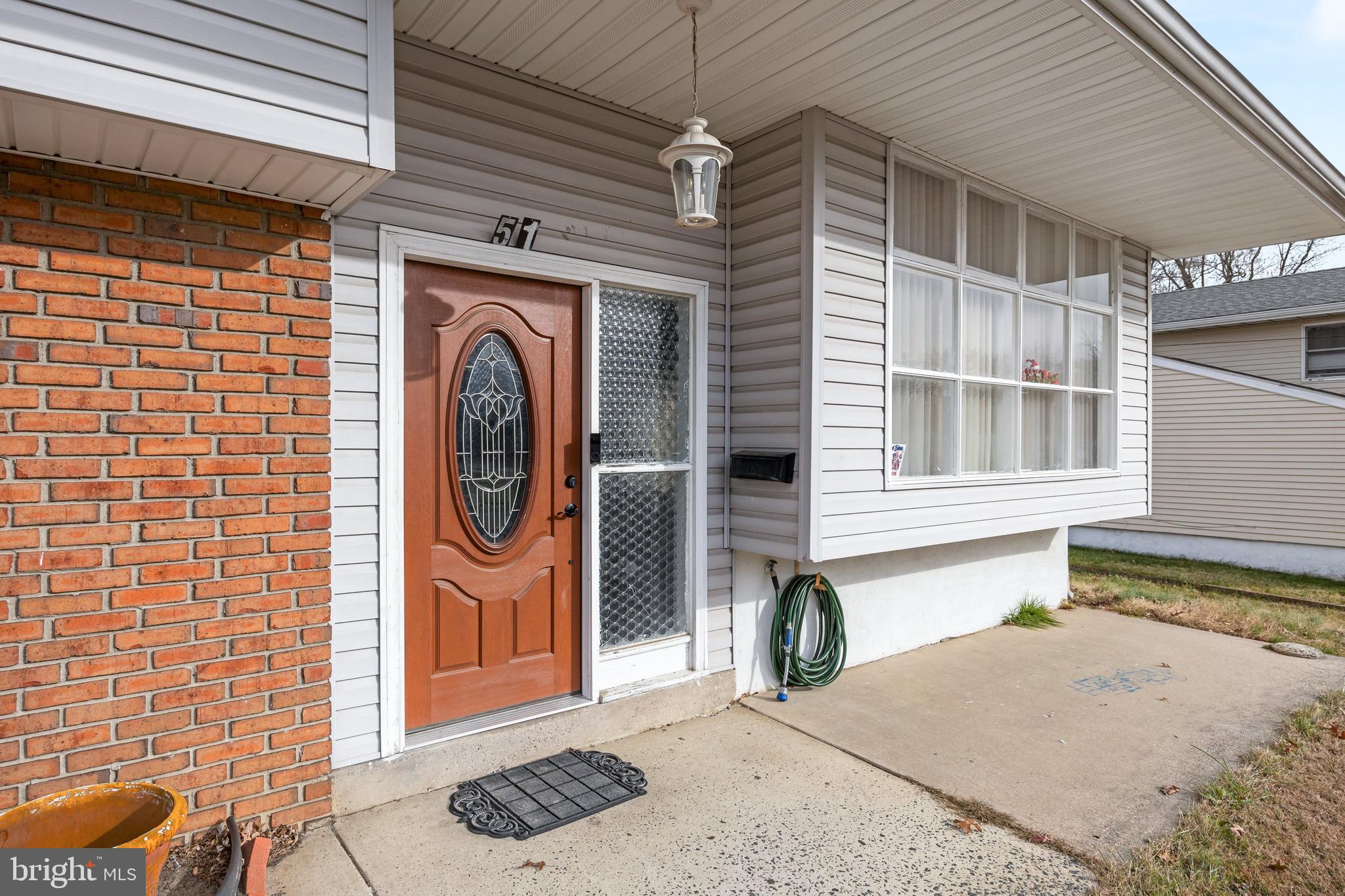 51 Suburban Boulevard Delran, NJ 08075 - Photo 4 of 29 a front view of a house with entryway