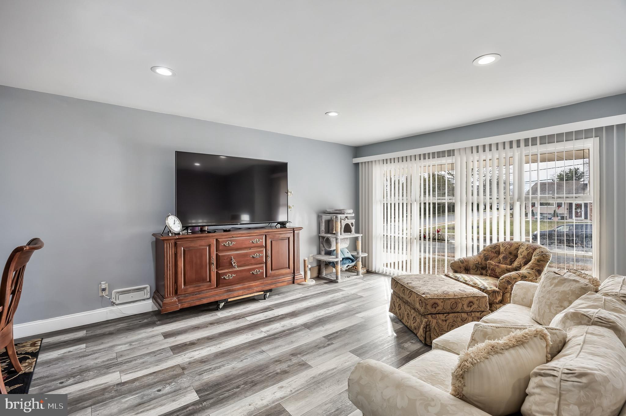 51 Suburban Boulevard Delran, NJ 08075 - Photo 6 of 29 a living room with furniture and a flat screen tv