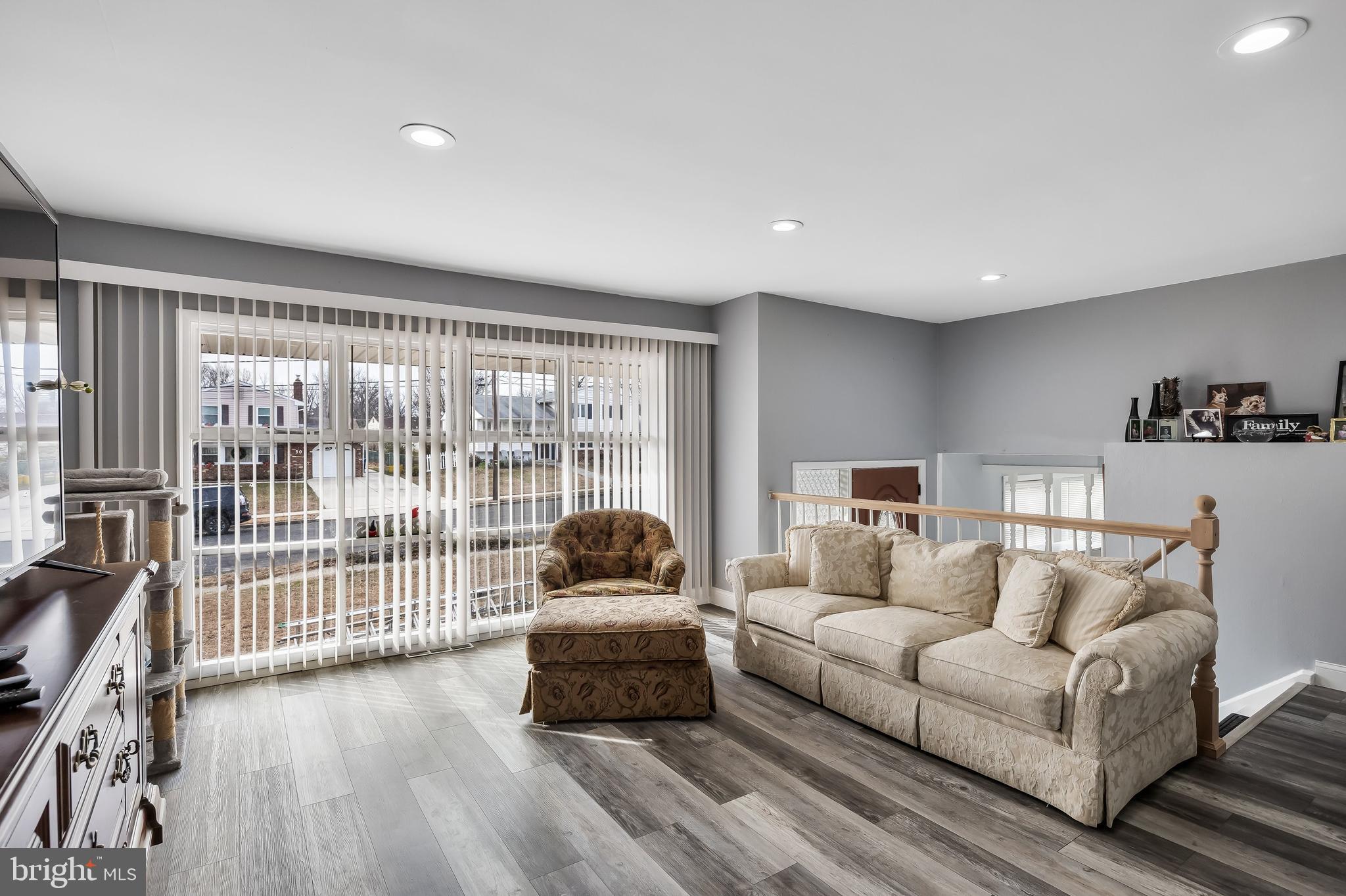 51 Suburban Boulevard Delran, NJ 08075 - Photo 7 of 29 a living room with furniture and a large window