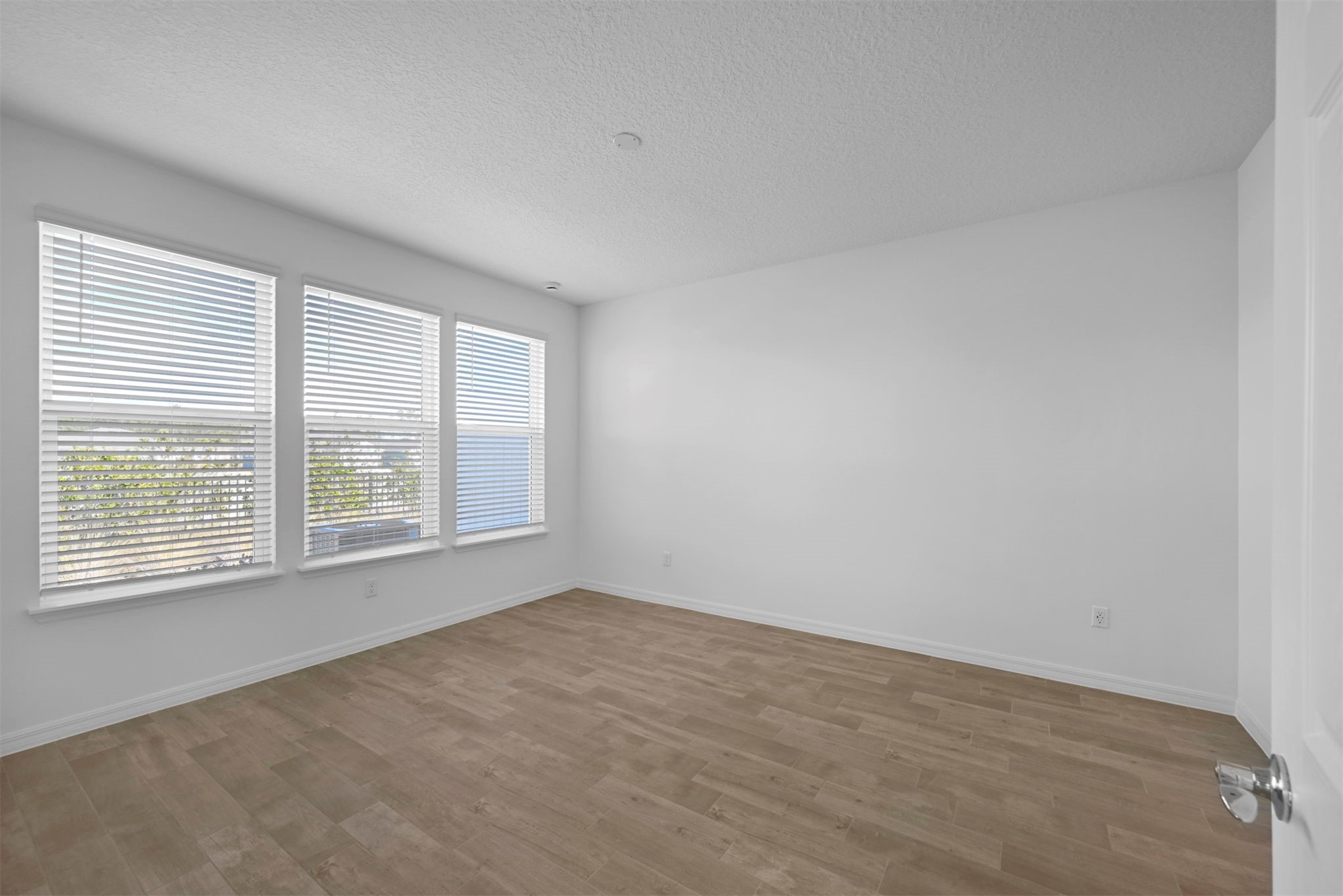 285 Ecliptic Loop Yulee, FL 32097 - Photo 17 of 42 an empty room with a window