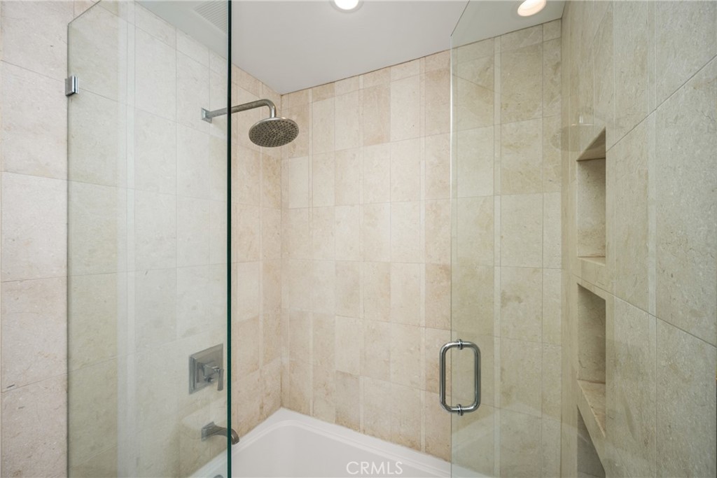 8 Moon Shadow, Unit 8 Irvine, CA 92603 - Photo 33 of 42 a bathroom with a shower curtain