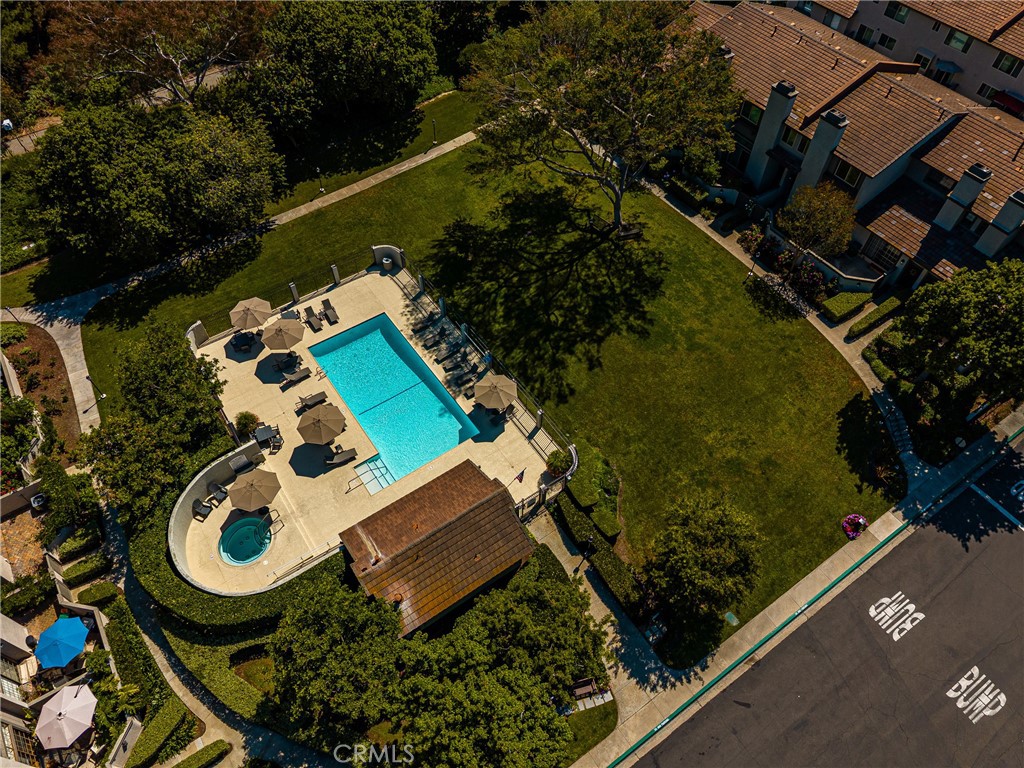 8 Moon Shadow, Unit 8 Irvine, CA 92603 - Photo 42 of 42 an aerial view of a house with swimming pool and outdoor space