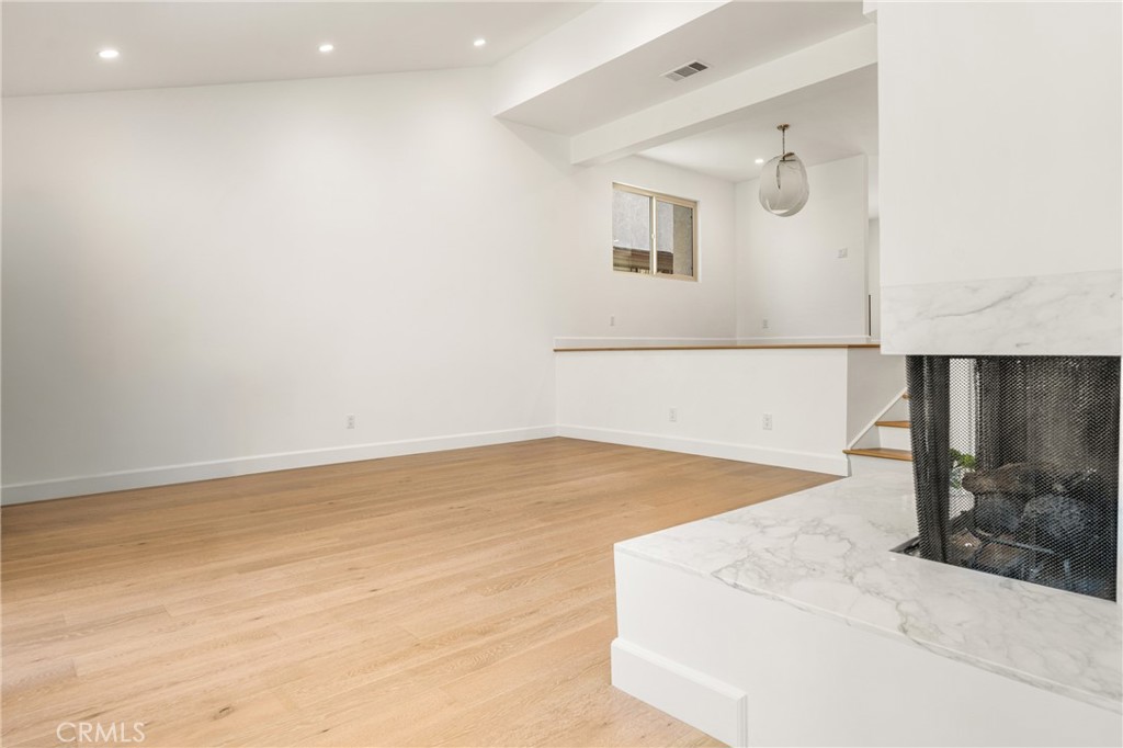 8 Moon Shadow, Unit 8 Irvine, CA 92603 - Photo 6 of 42 a view of a kitchen with a sink