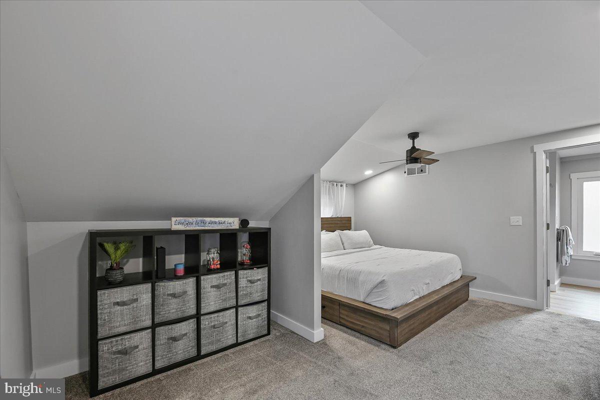 1602 Almonesson Road Woodbury, NJ 08096 - Photo 21 of 32 a bedroom with a bed and a window