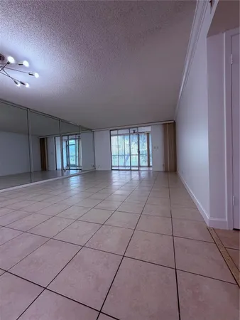 a view of a livingroom with a large window