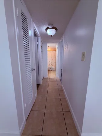 a view of a hallway from a corridor