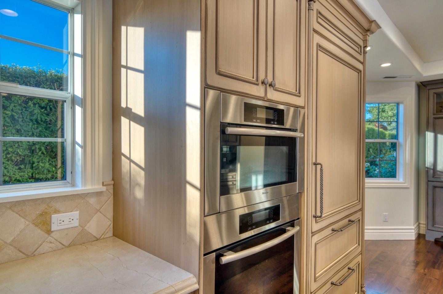 400 Seaview Drive Aptos, CA 95003 - Photo 13 of 58 a kitchen with stainless steel appliances a refrigerator and a window