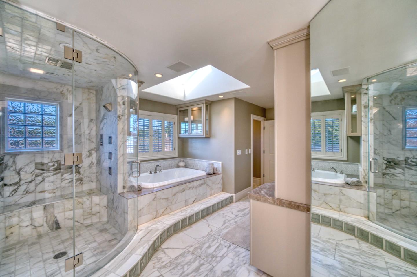 400 Seaview Drive Aptos, CA 95003 - Photo 33 of 58 a spacious bathroom with a double vanity sink and a mirror