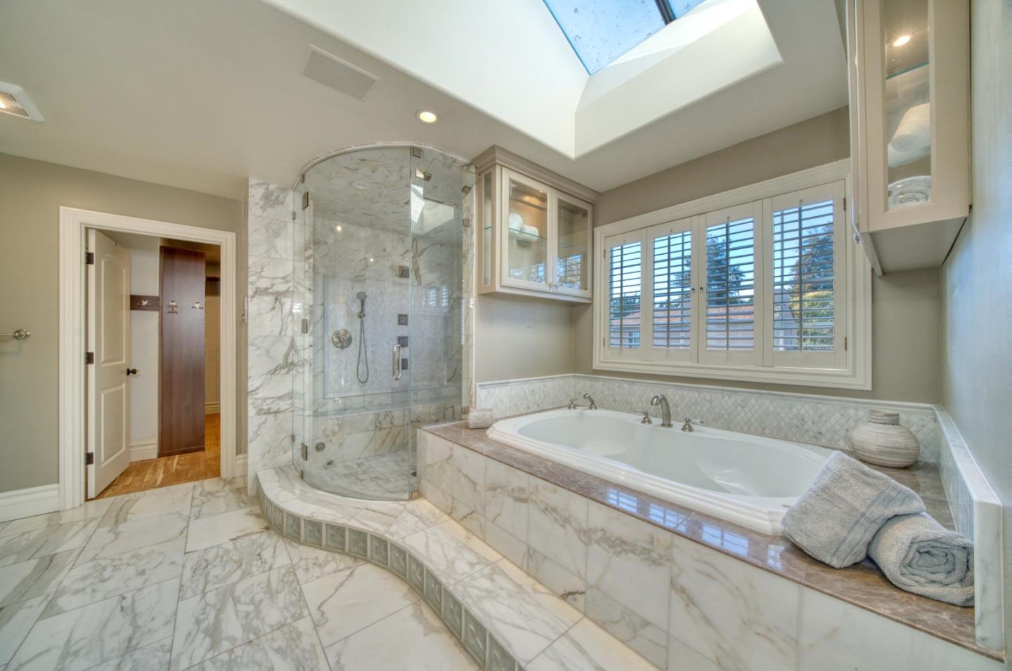 400 Seaview Drive Aptos, CA 95003 - Photo 34 of 58 a spacious bathroom with a tub shower and sink
