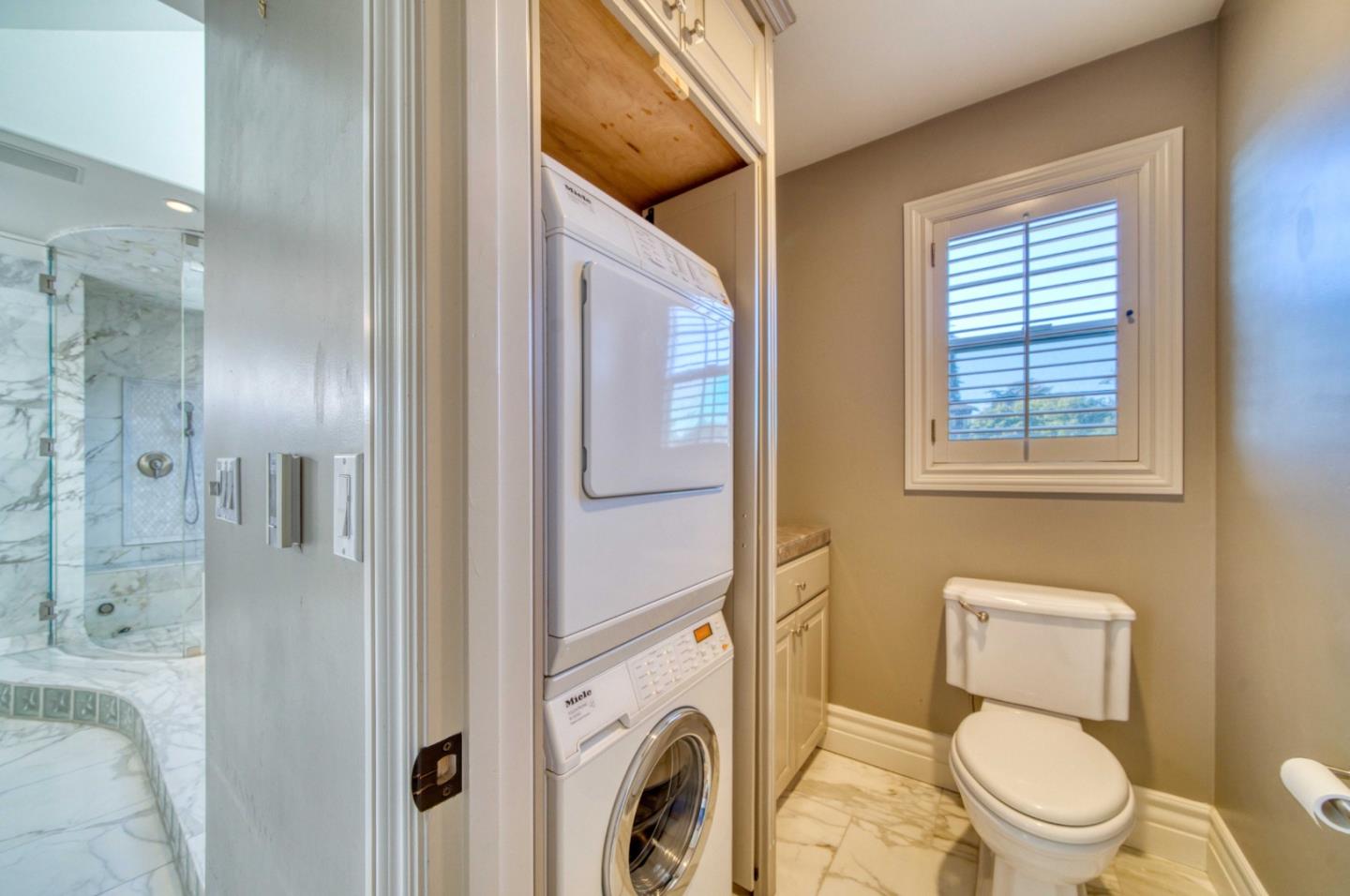 400 Seaview Drive Aptos, CA 95003 - Photo 38 of 58 a white toilet sitting next to a bathroom sink