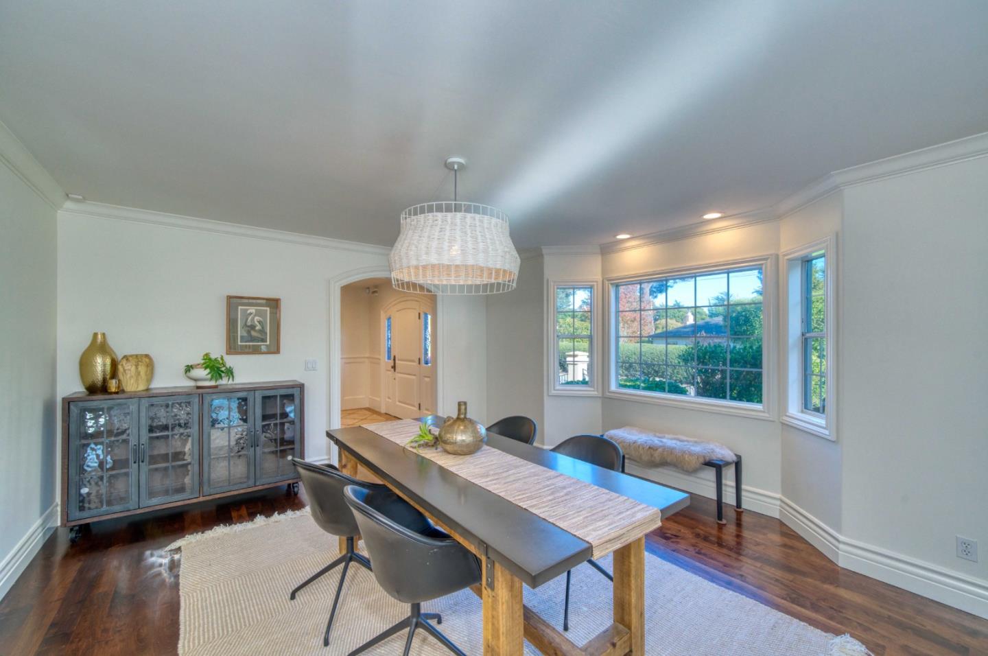 400 Seaview Drive Aptos, CA 95003 - Photo 5 of 58 a view of a dining room with furniture a chandelier and wooden floor