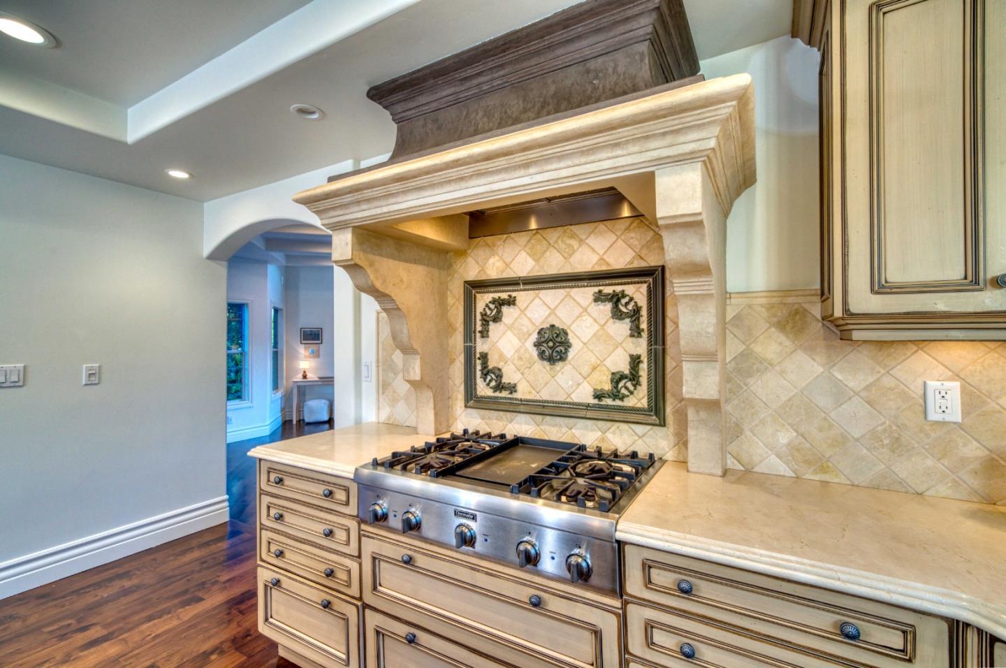400 Seaview Drive Aptos, CA 95003 - Photo 8 of 58 a stove top oven sitting inside of a kitchen