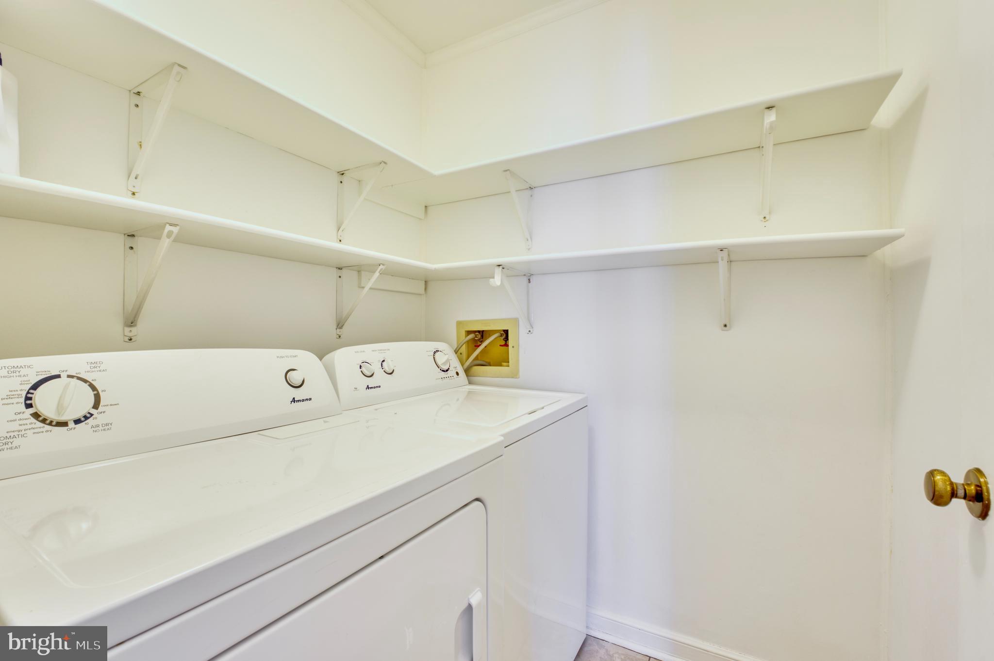 241 Loudoun Street Southwest, Unit F Leesburg, VA 20175 - Photo 22 of 32 Large Laundry with Lots of Room for Storage