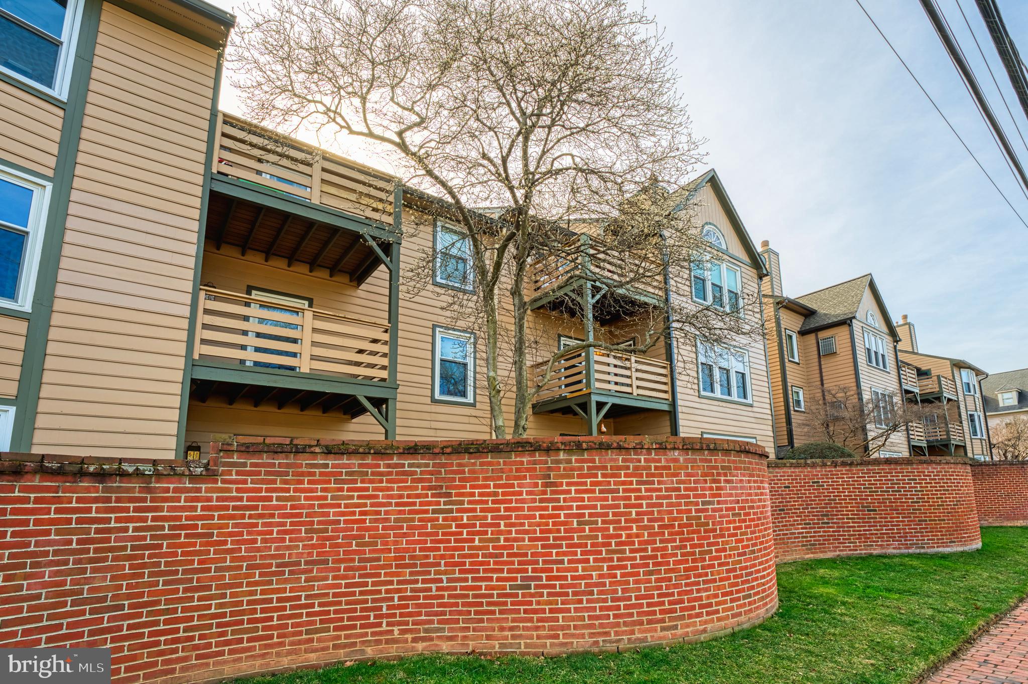 241 Loudoun Street Southwest, Unit F Leesburg, VA 20175 - Photo 25 of 32 Back of Condo Building