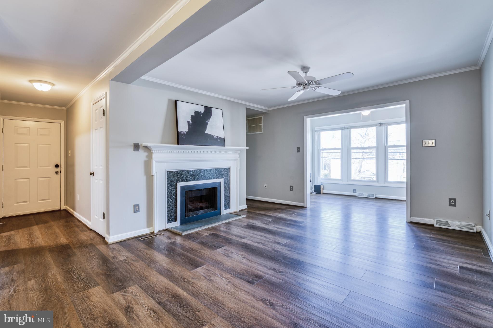 241 Loudoun Street Southwest, Unit F Leesburg, VA 20175 - Photo 10 of 32 Large Living Room with Gas Fireplace