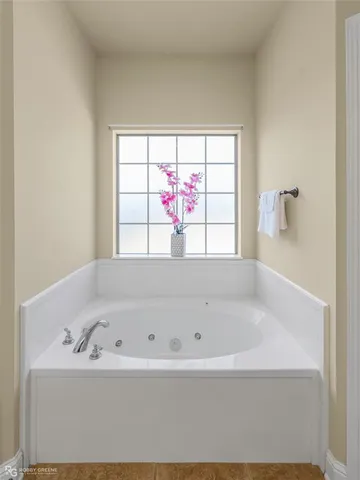 a bathroom with a sink a mirror and a light fixture