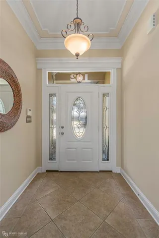 a view of entryway with a fan