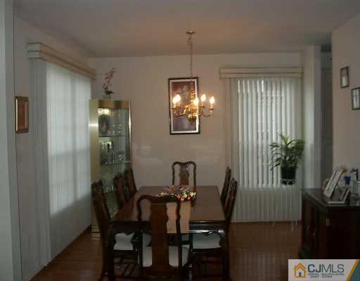49 Timber Ridge Road North Brunswick, NJ 08902 - Photo 3 of 8 a view of a dining room with furniture and window