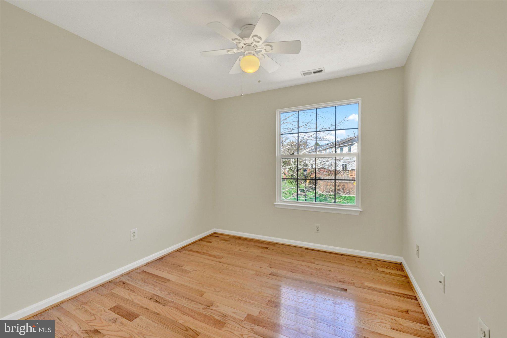 7120 Natures Road Columbia, MD 21046 - Photo 11 of 20 Bright and airy 2nd bedroom with natural light.