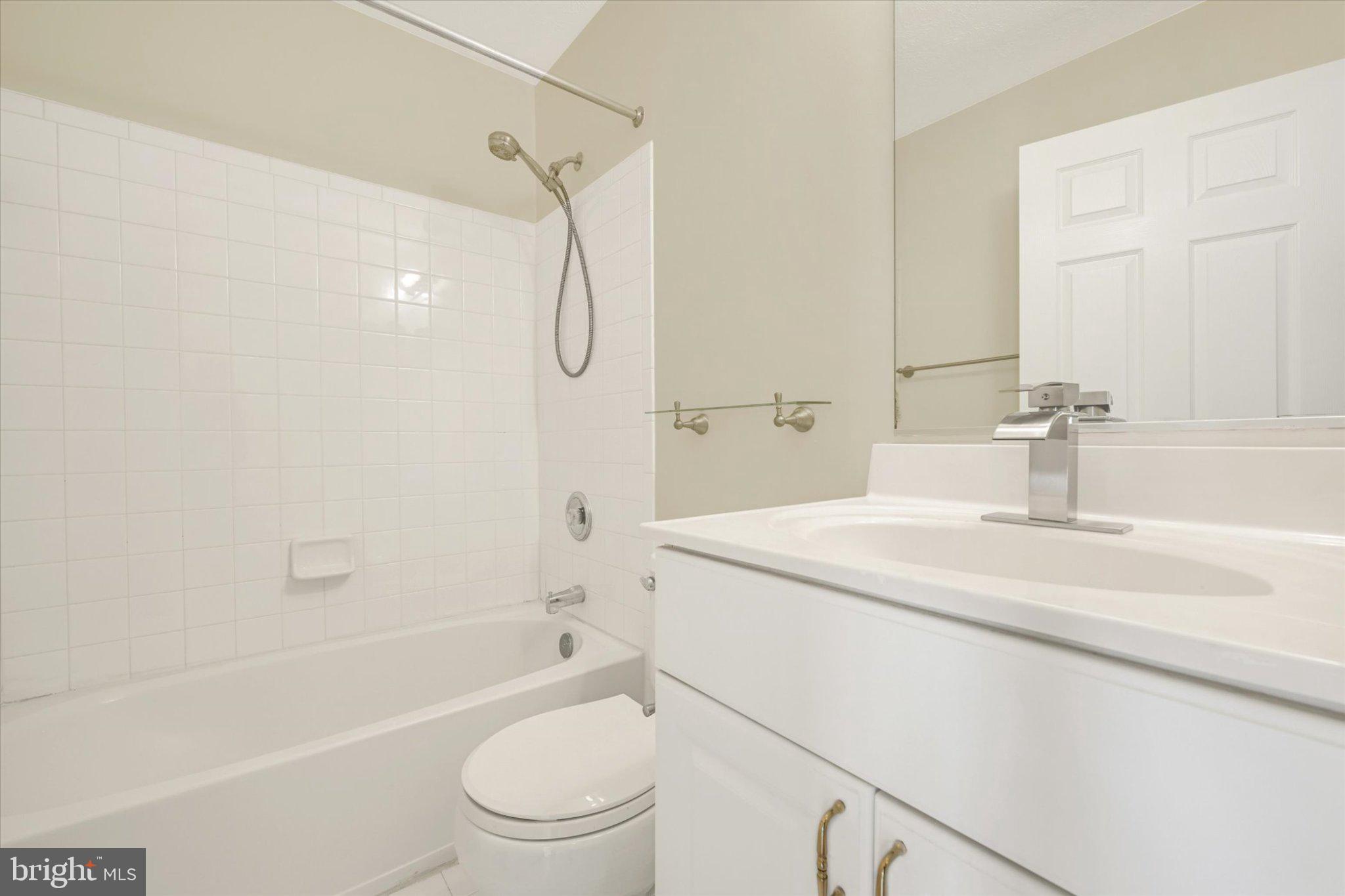 7120 Natures Road Columbia, MD 21046 - Photo 13 of 20 Modern 2nd level bathroom with sleek finishes.