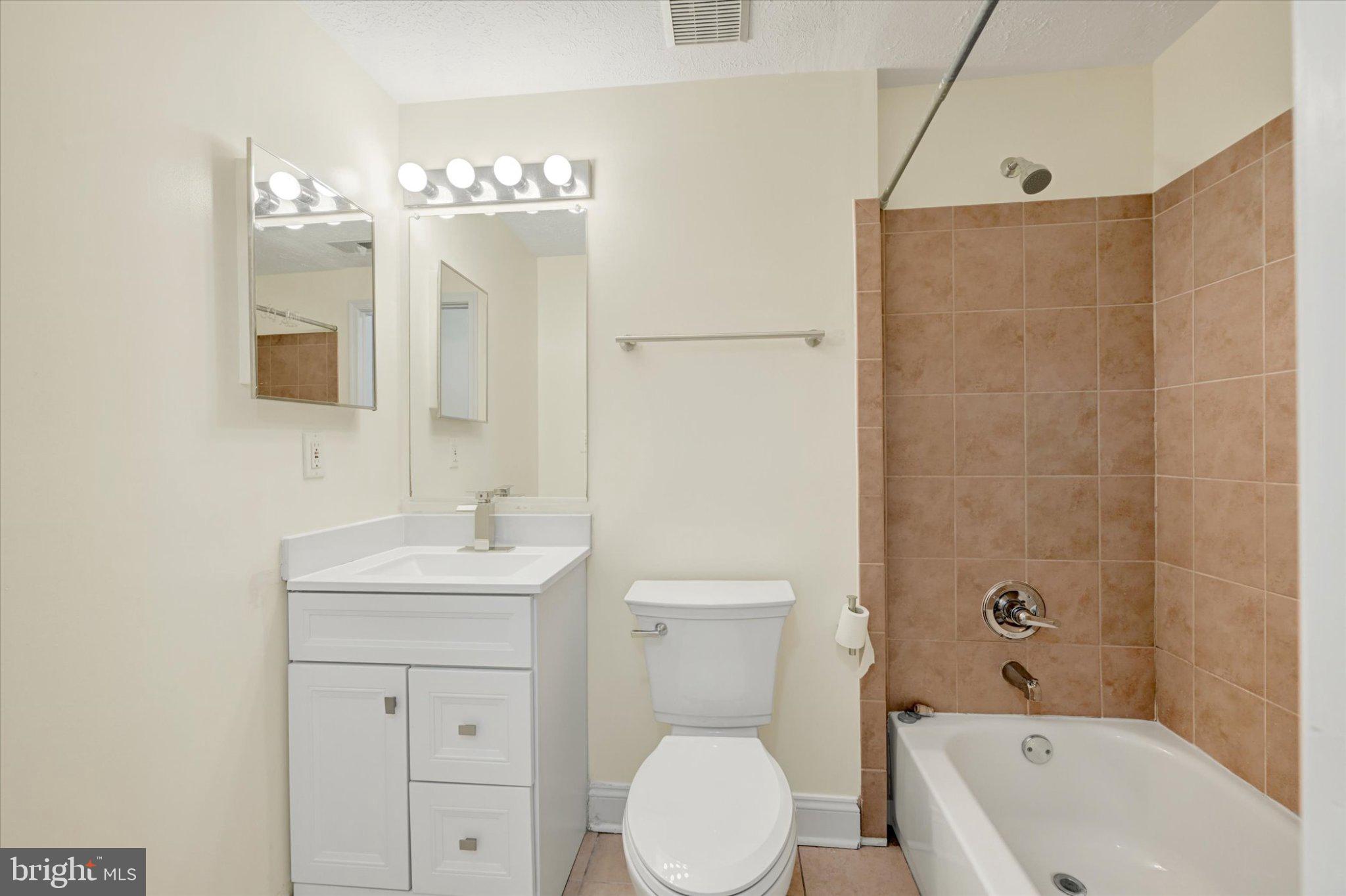 7120 Natures Road Columbia, MD 21046 - Photo 15 of 20 Modern lower level bathroom with elegant finishes.