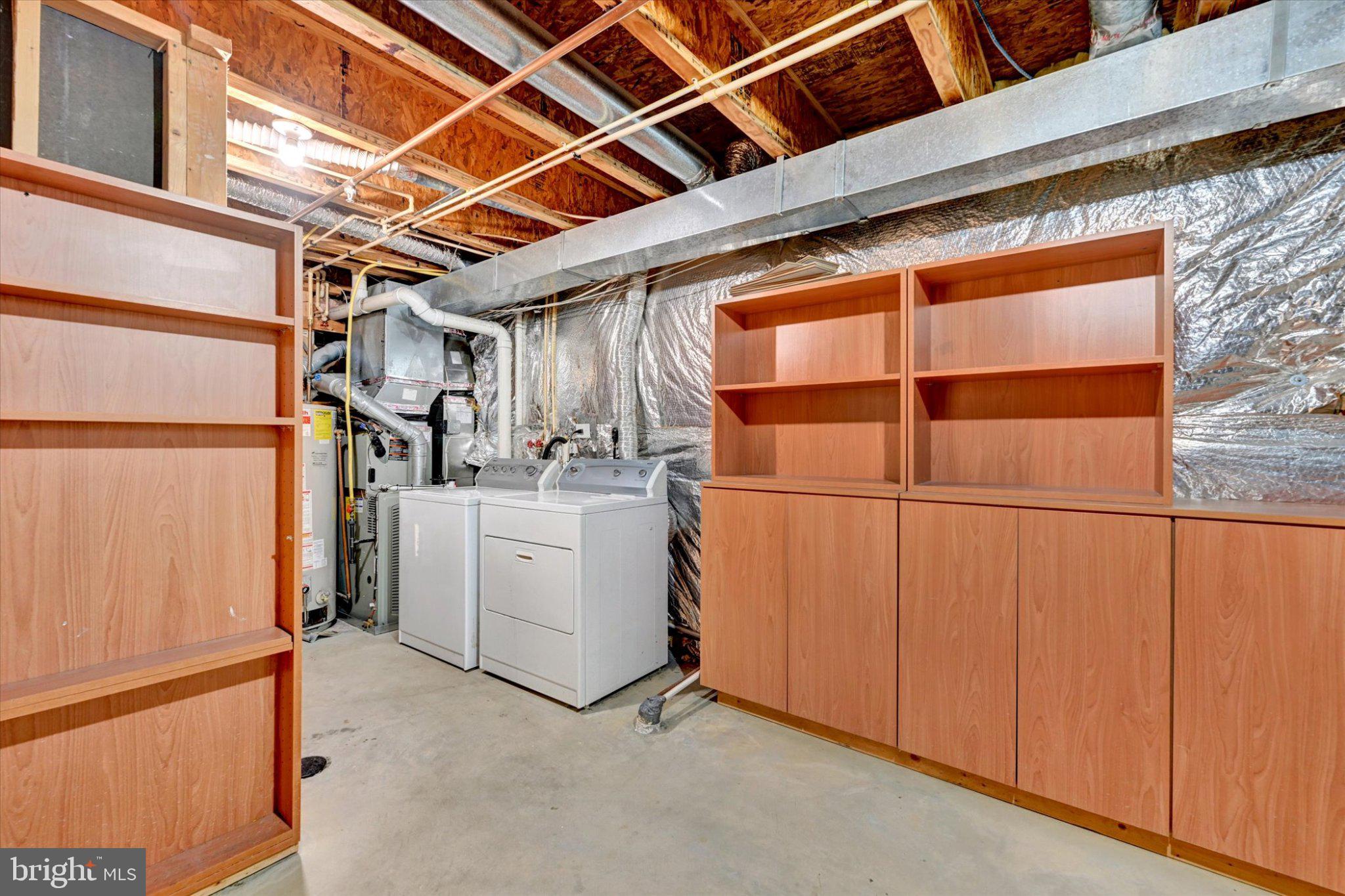 7120 Natures Road Columbia, MD 21046 - Photo 16 of 20 Spacious basement storage with laundry area.