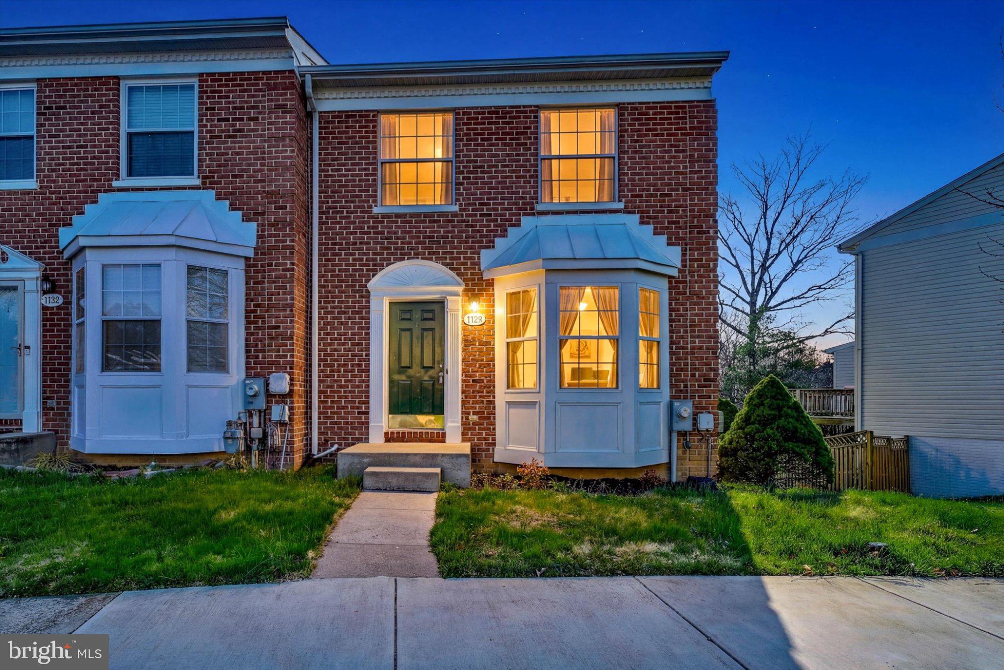 7120 Natures Road Columbia, MD 21046 - Photo 2 of 20 Charming brick home at twilight glow.