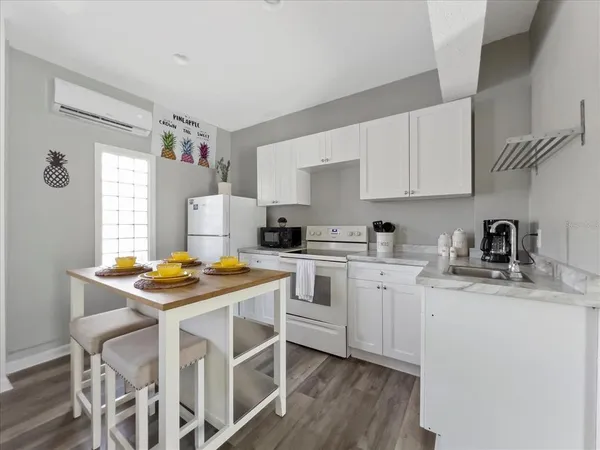 a picture of a room with wall and cabinet