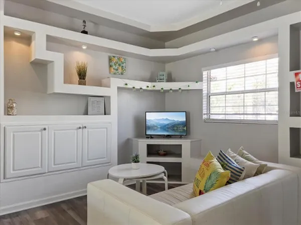 an aerial view of residential house with outdoor space and parking