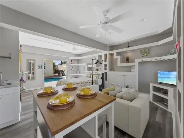 a view of a living room and dining room