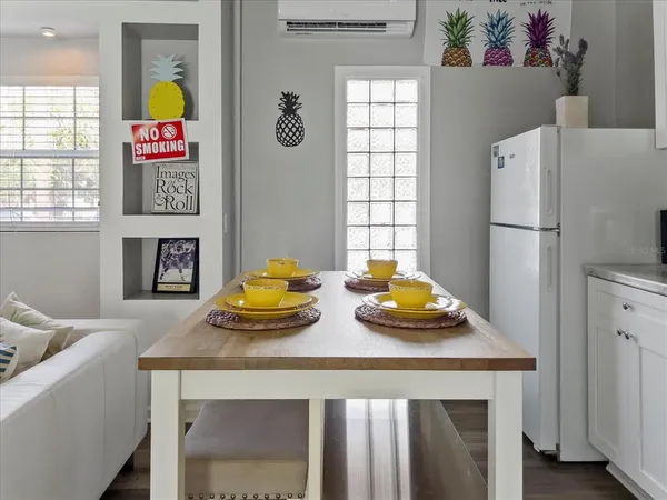an aerial view of a residential houses with outdoor space