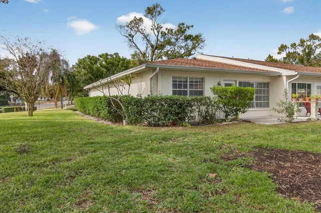 a view of a patio with swimming pool