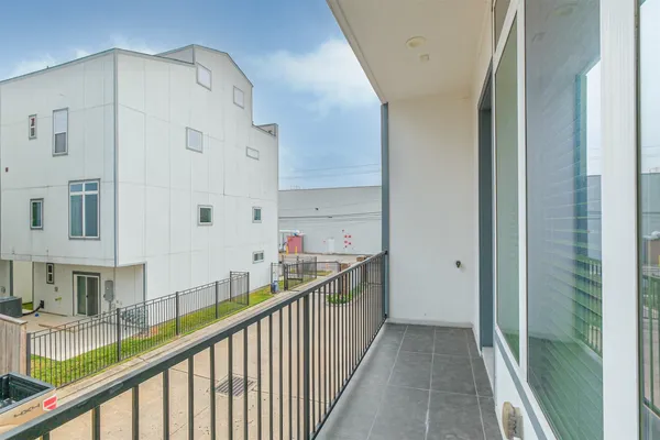 a view of a kitchen with a sink and cabinets
