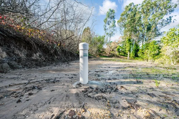 a view of a lake with mountains in the background