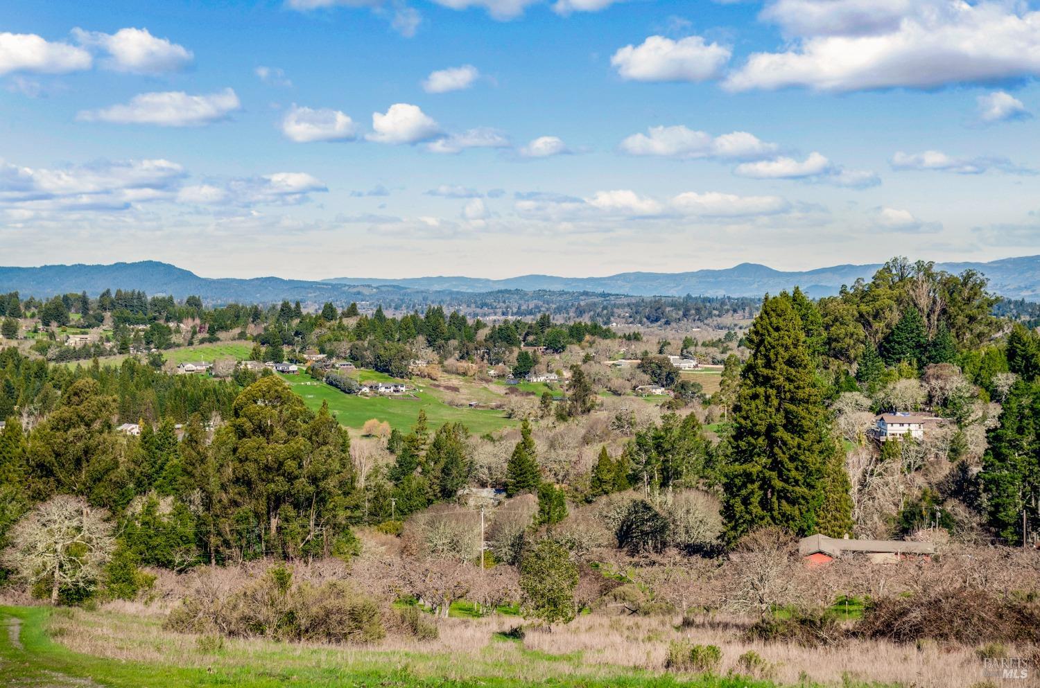 459 Gold Ridge Road Sebastopol, CA 95472 - Photo 27 of 29 a view of a lake with mountains in the background