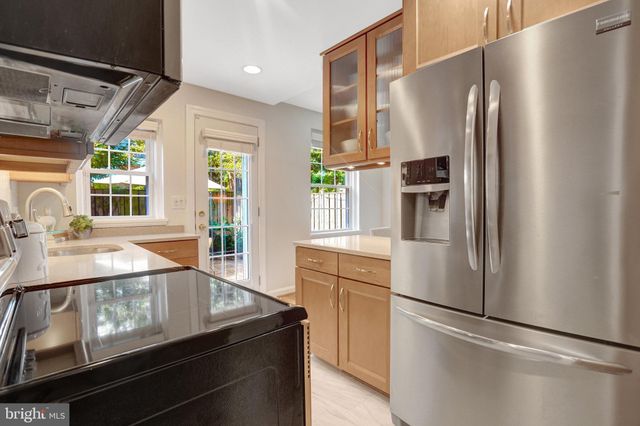 a view of a bedroom from a hallway