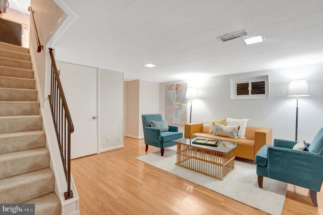 a view of a workspace with furniture