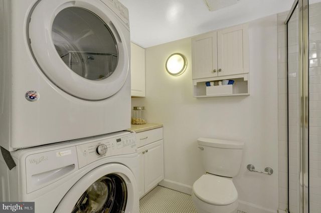 a swimming pool with outdoor seating and yard