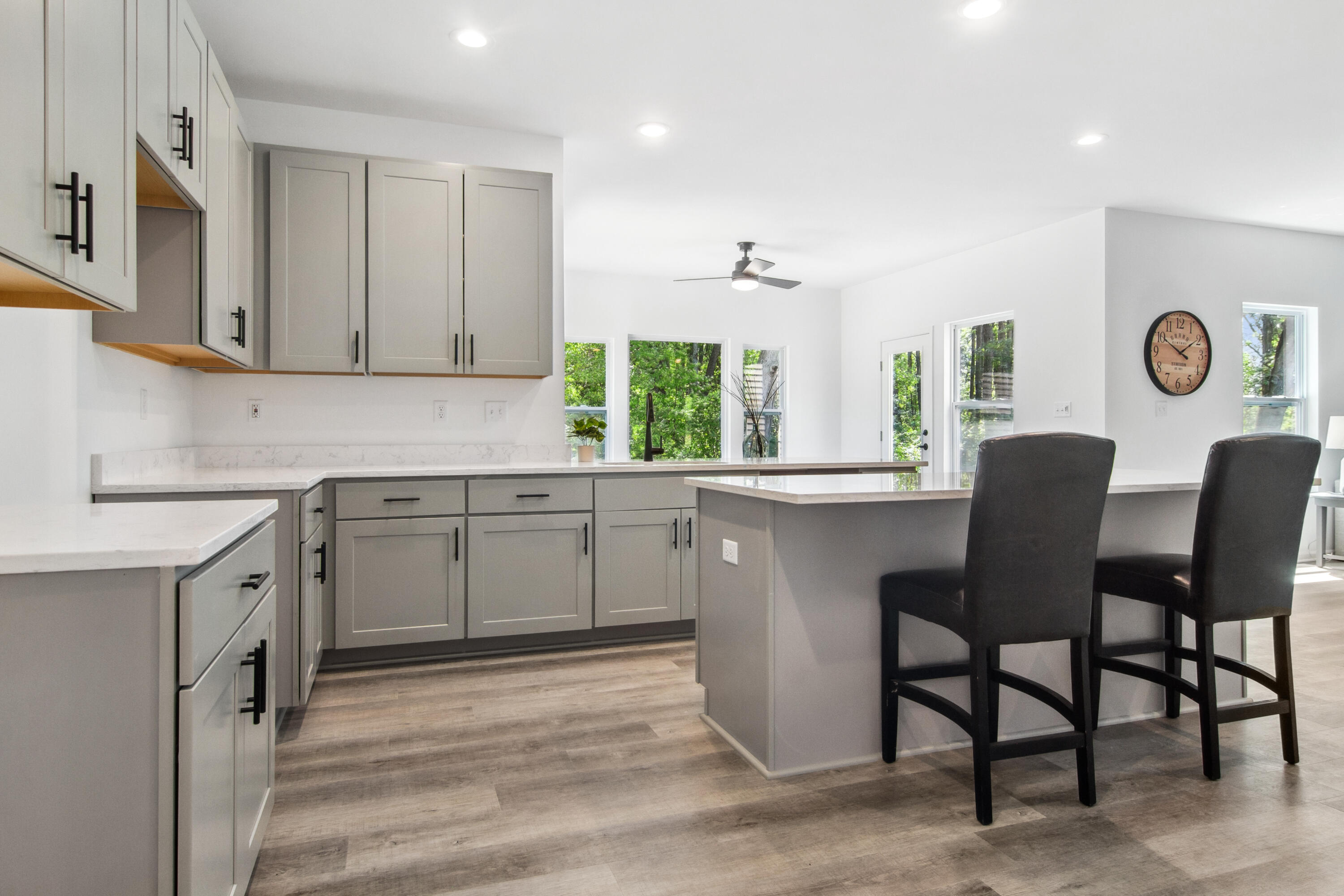 10360 California Street Crown Point, IN 46307 - Photo 12 of 22 a kitchen with cabinets table and chairs