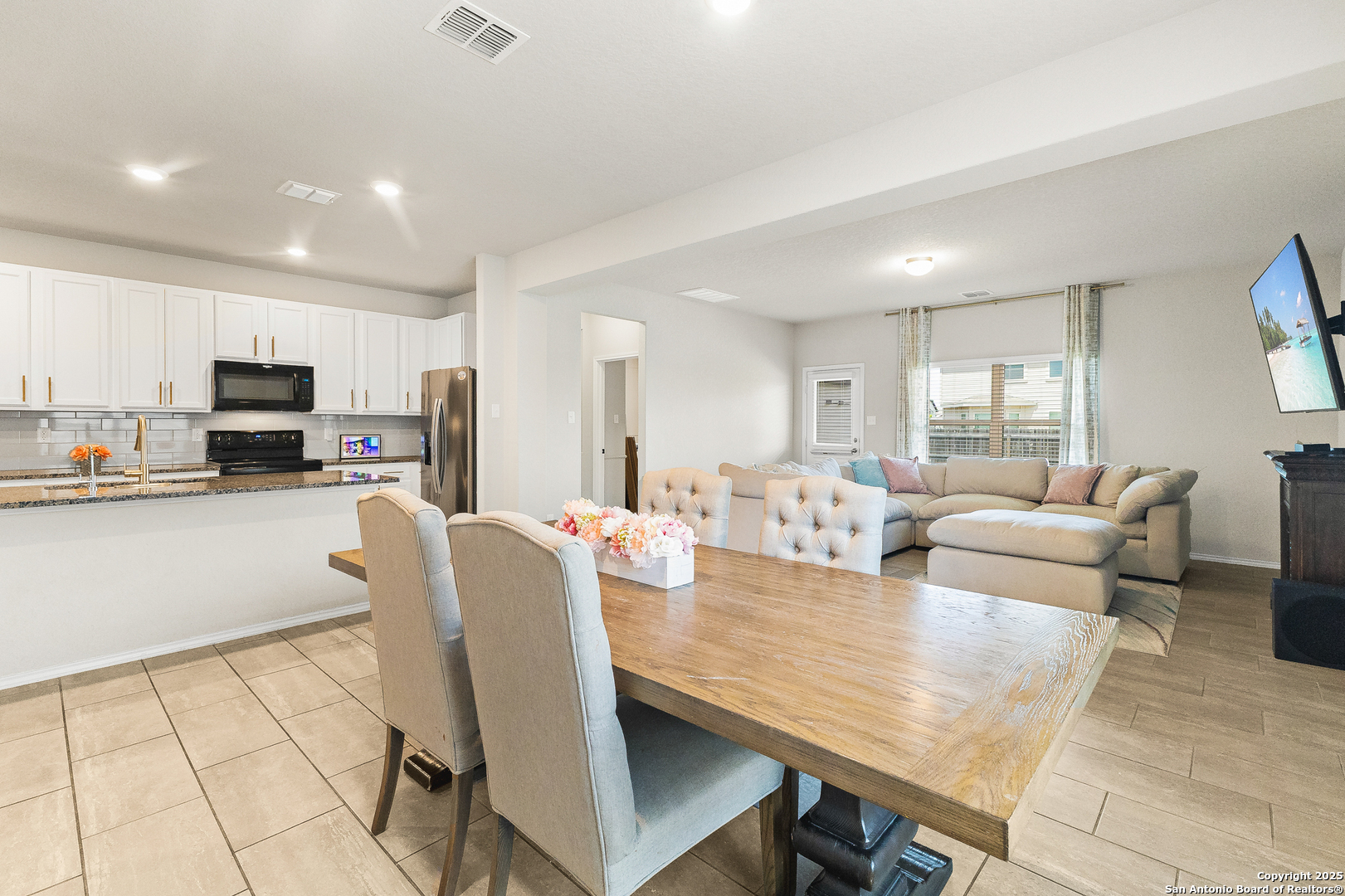 217 Stag Way Cibolo, TX 78108 - Photo 12 of 31 a living room with furniture and a flat screen tv