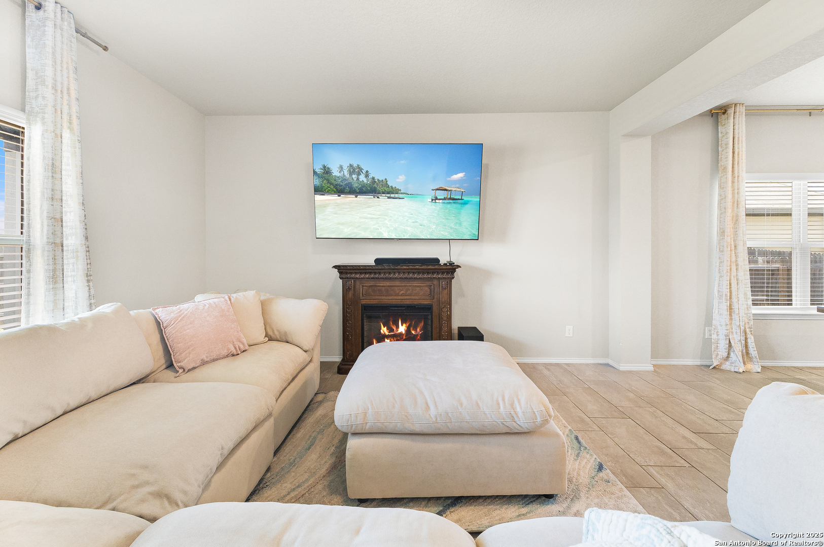 217 Stag Way Cibolo, TX 78108 - Photo 14 of 31 a living room with furniture and a fireplace