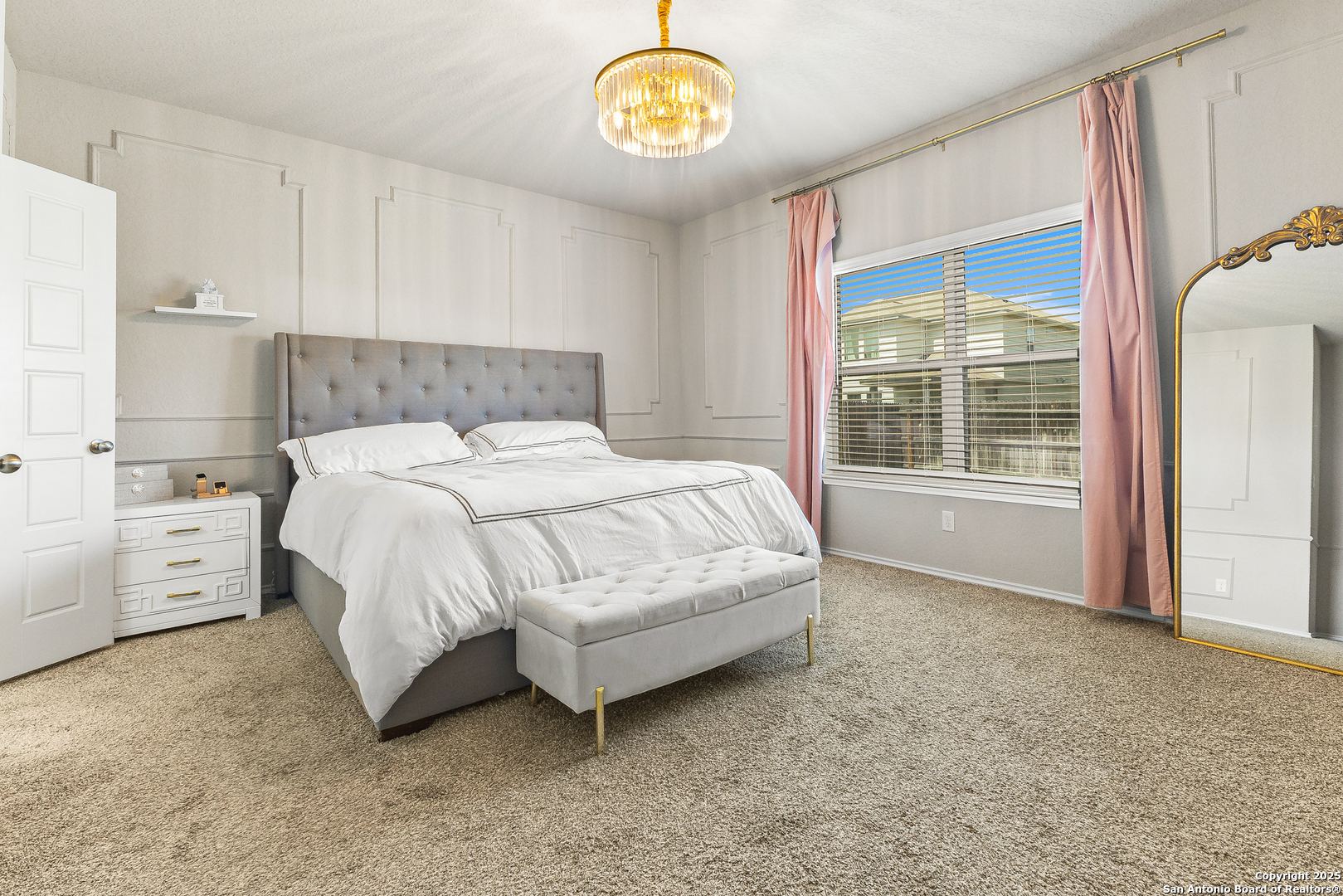 217 Stag Way Cibolo, TX 78108 - Photo 15 of 31 a spacious bedroom with a bed and a window