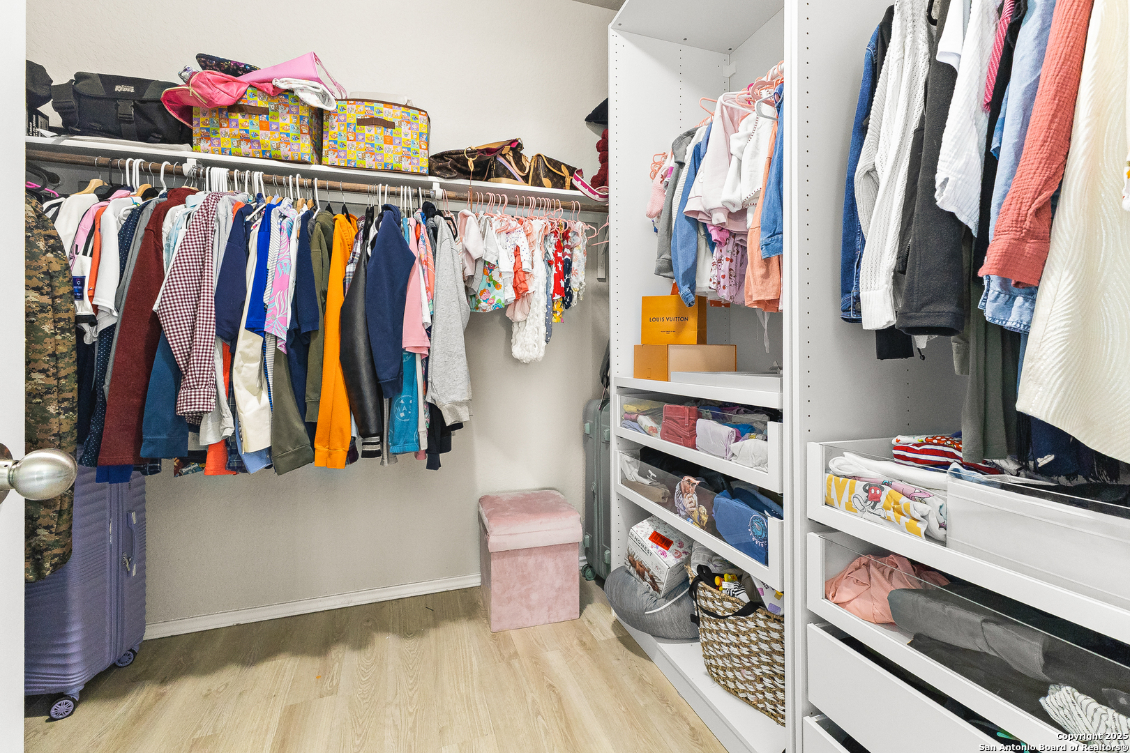 217 Stag Way Cibolo, TX 78108 - Photo 20 of 31 a view of walk in closet with clothes and shoes