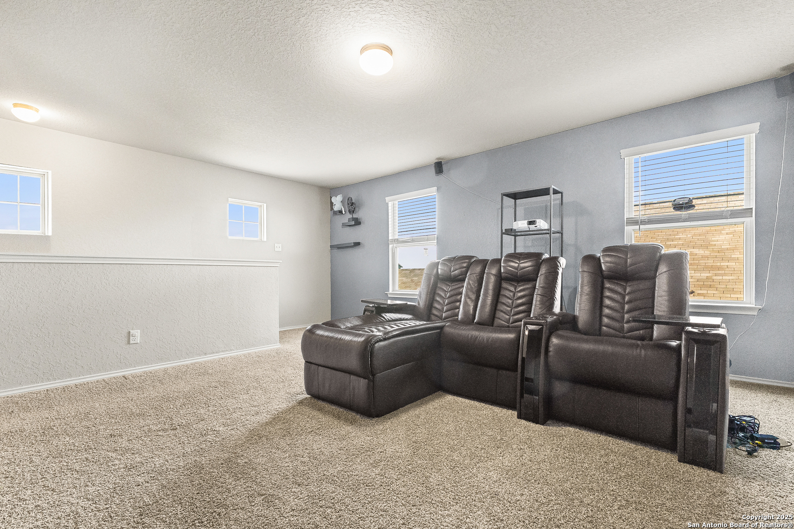 217 Stag Way Cibolo, TX 78108 - Photo 22 of 31 a living room with furniture a couch and a window