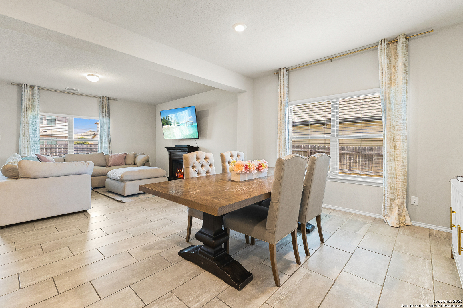 217 Stag Way Cibolo, TX 78108 - Photo 10 of 31 a living room with furniture a rug and a window