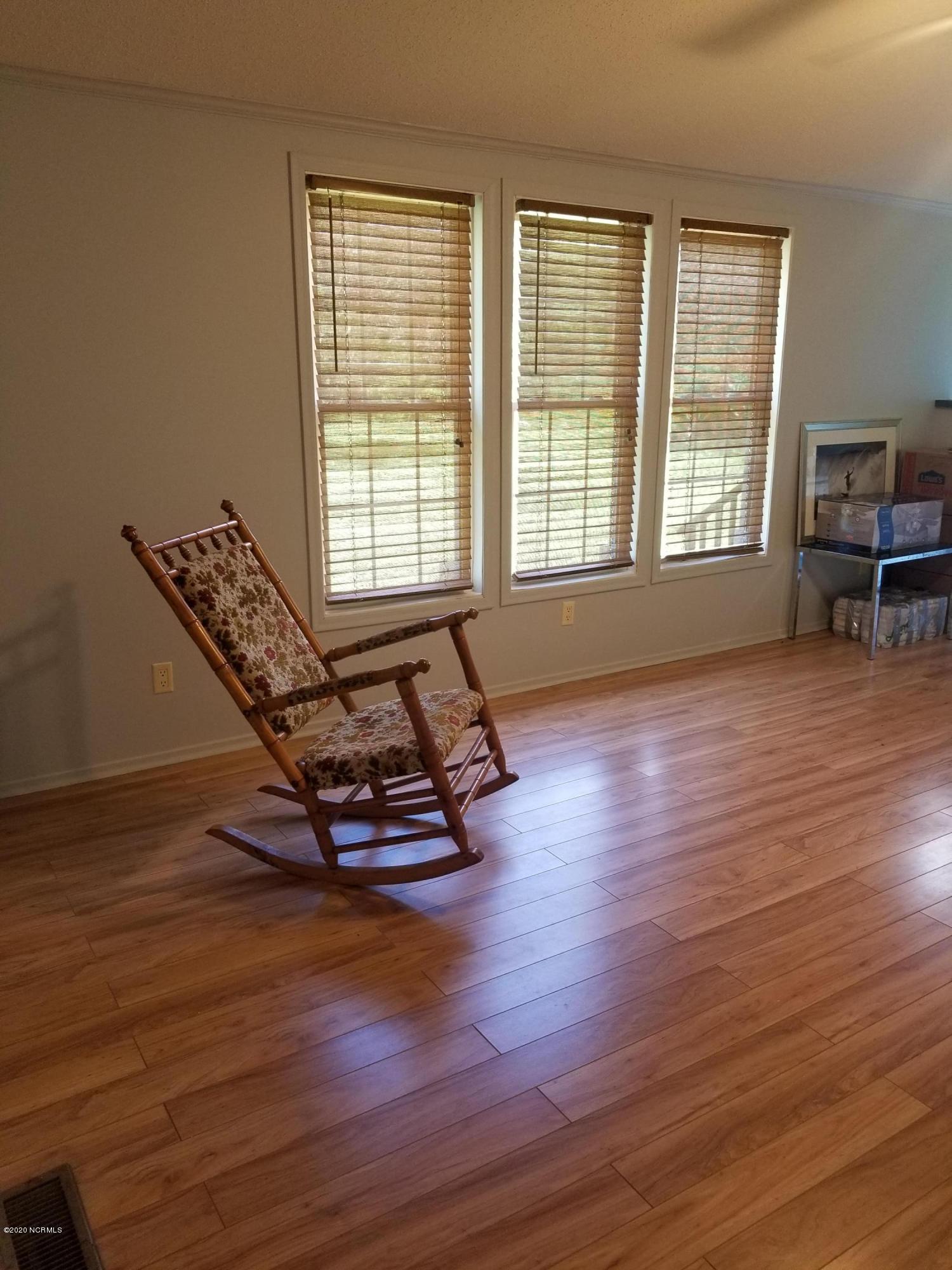 1340 Sloop Point Road Hampstead, NC 28443 - Photo 3 of 17 Living Room with many windows