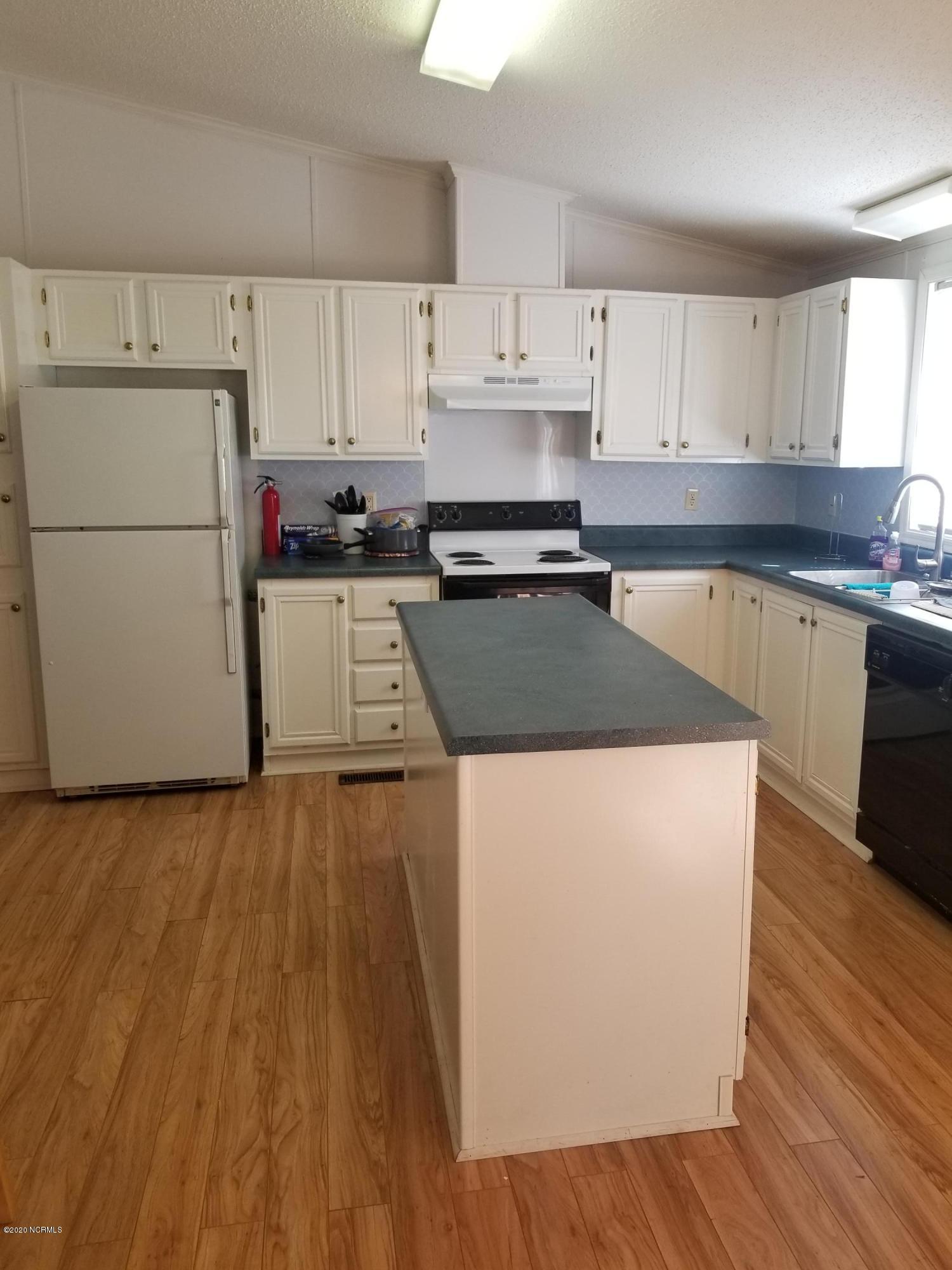 1340 Sloop Point Road Hampstead, NC 28443 - Photo 6 of 17 View of Kitchen from Dining Area
